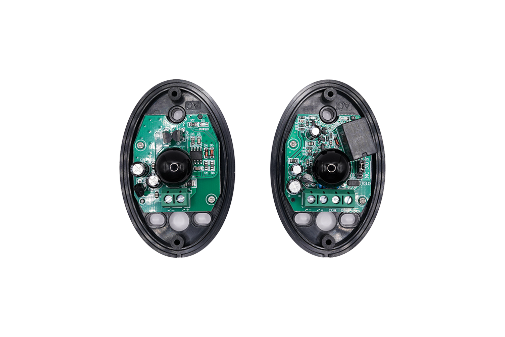 Internal circuit board view of universal infrared photocell sensor showing relay components - NSD SMART